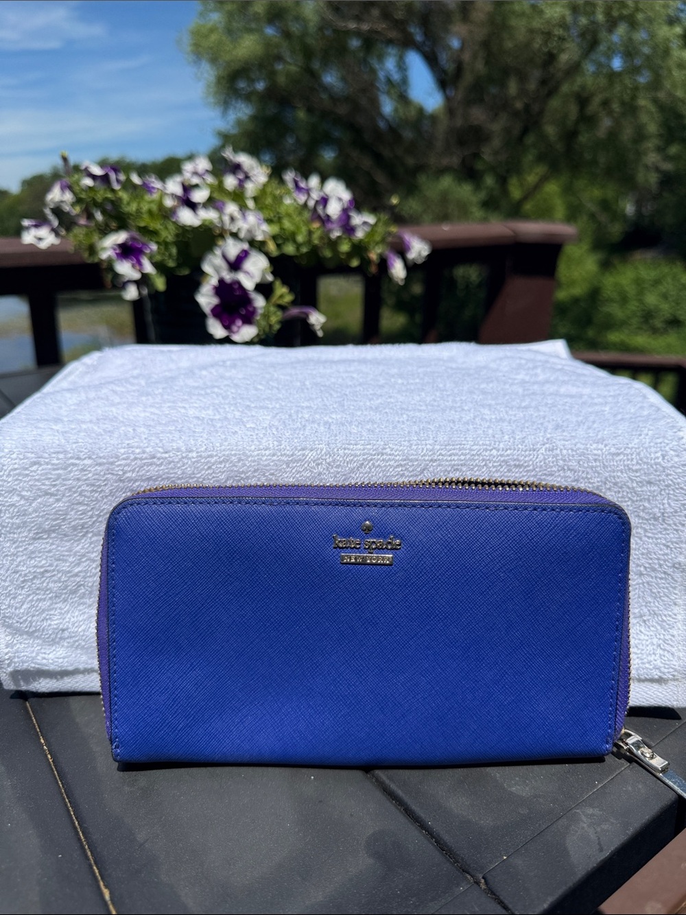 kate spade purple zip-around wallet with gold logo
